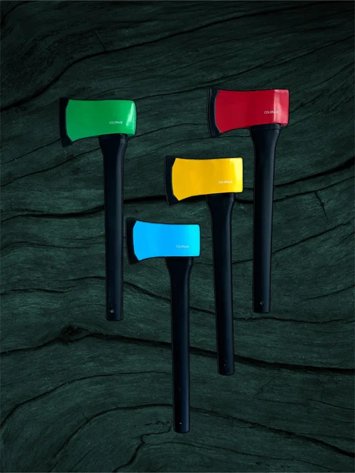 Four black-handled Coloured Axes with green, red, yellow and blue heads against dark timber