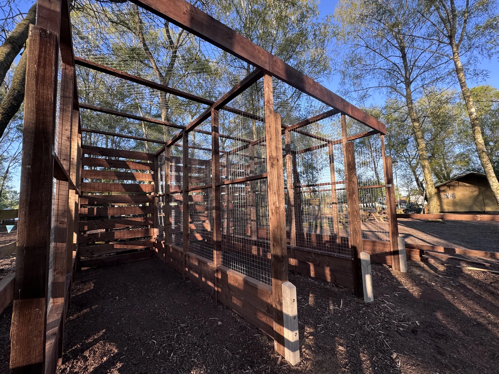 Timber and mesh outdoor lane structure at Tattershall Lakes before target faces are fitted