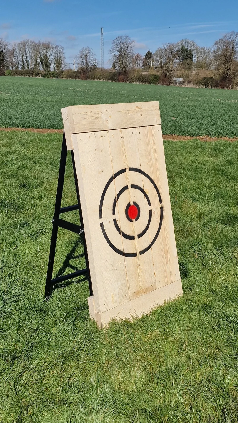 Complete small portable folding target holder with timber target fitted to its black steel frame
